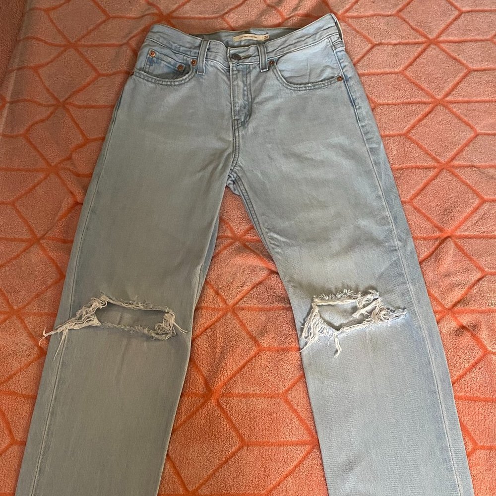 light blue Levis mid-rise jeans